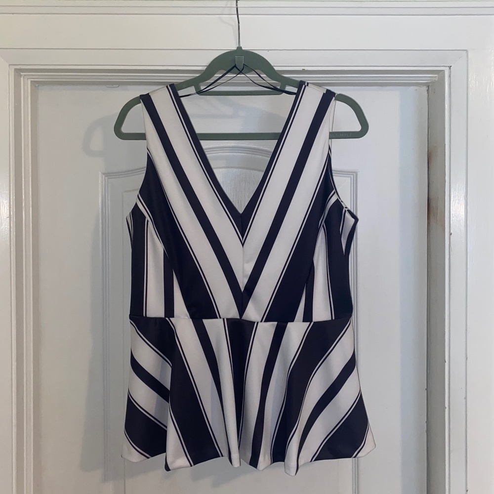 Deep V Sleeveless Peplum Blouse